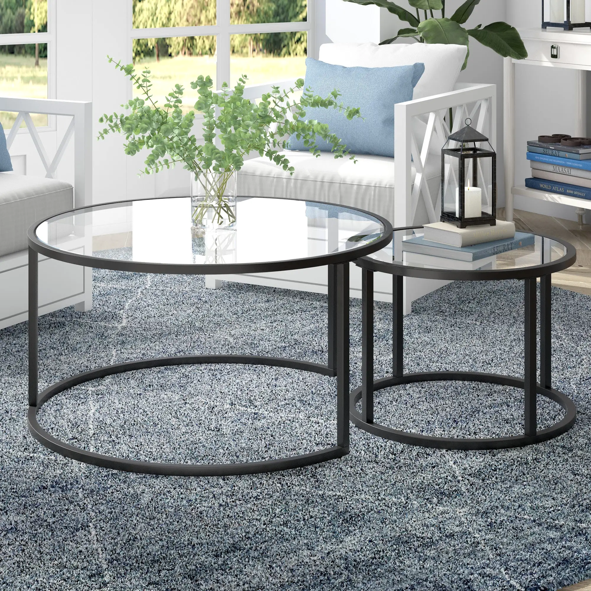 Set of Two 35 Black Glass And Steel Round Nested Coffee Tables