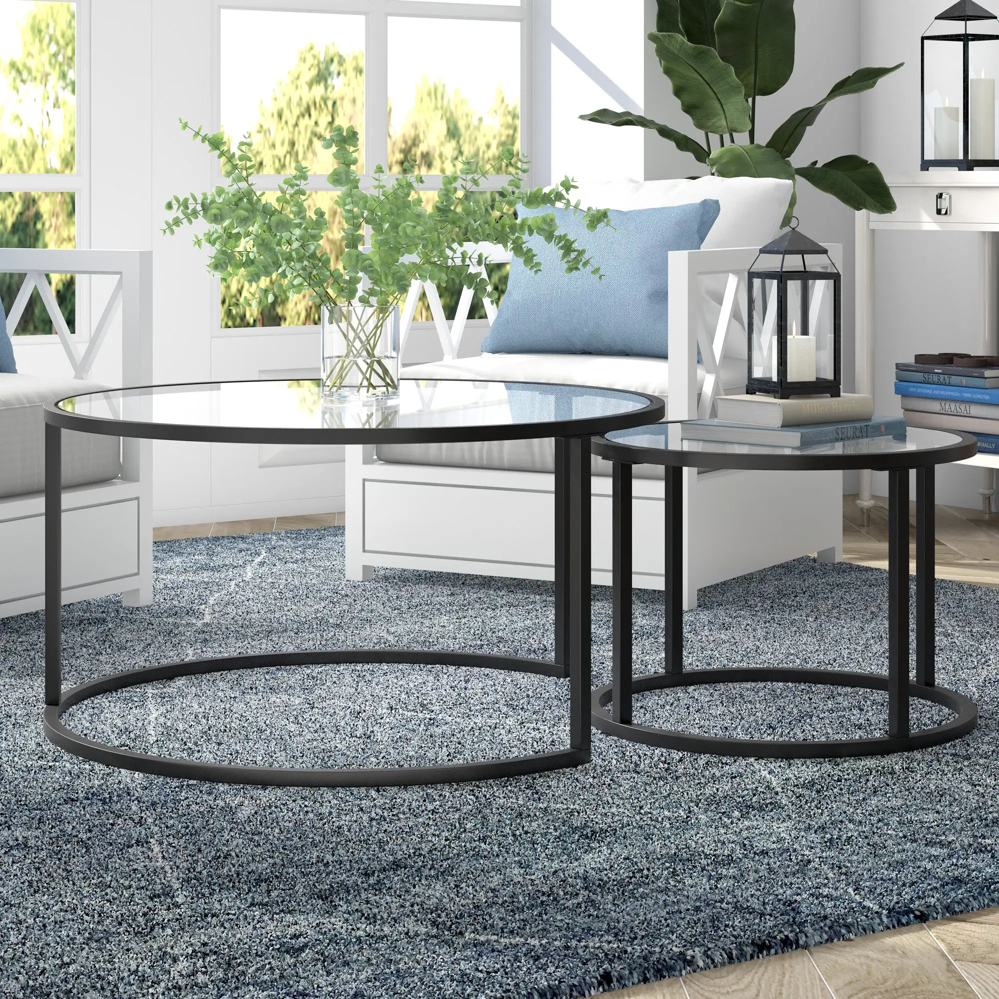 Set of Two 35 Black Glass And Steel Round Nested Coffee Tables