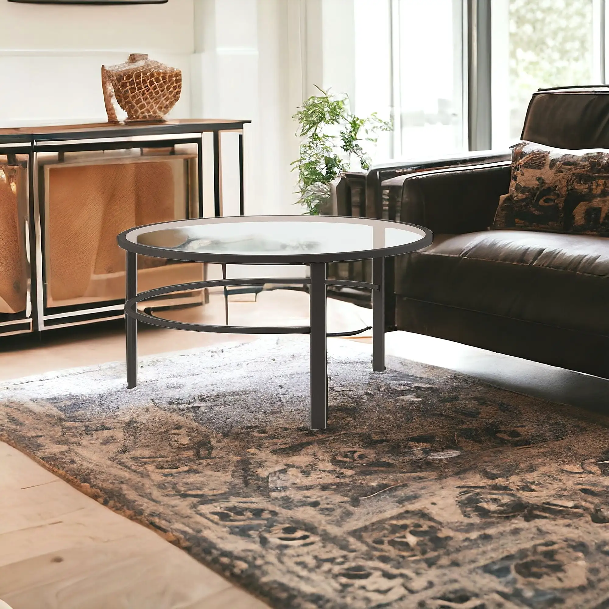 Set of Two 36 Clear And Black Glass And Steel Round Nested Coffee Tables