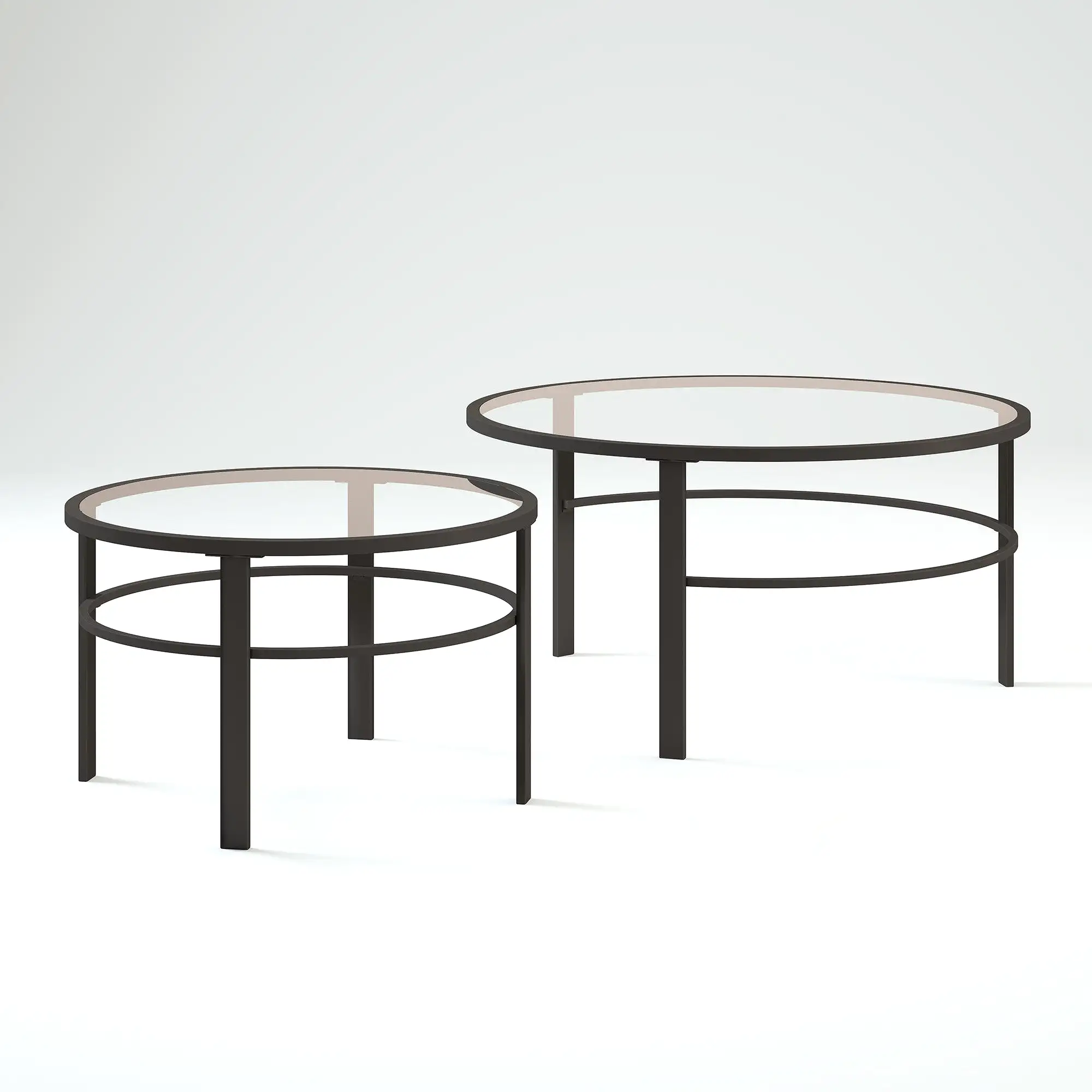 Set of Two 36 Clear And Black Glass And Steel Round Nested Coffee Tables